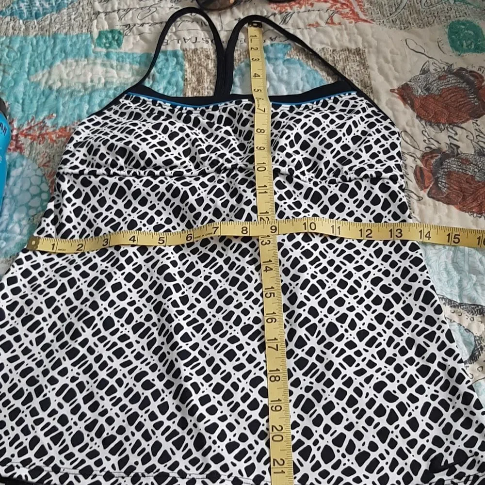 Nike bathing suit top, black and white with aqua trim.